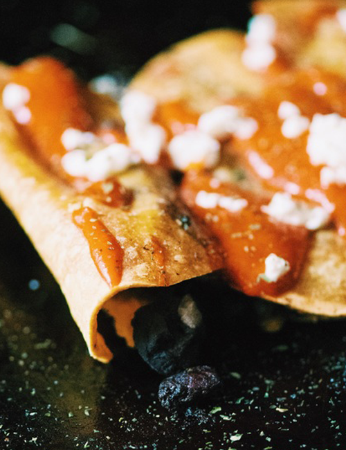 baked bean & onion flautas with red chili drizzle